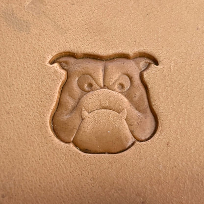Dog leather stamp LT257 — single impression on veg-tan leather