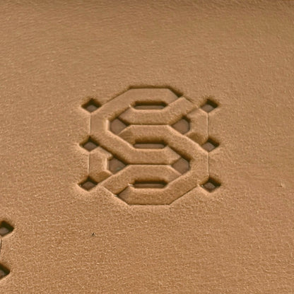 Geometric leather stamp LT258 — single impression on veg-tan leather