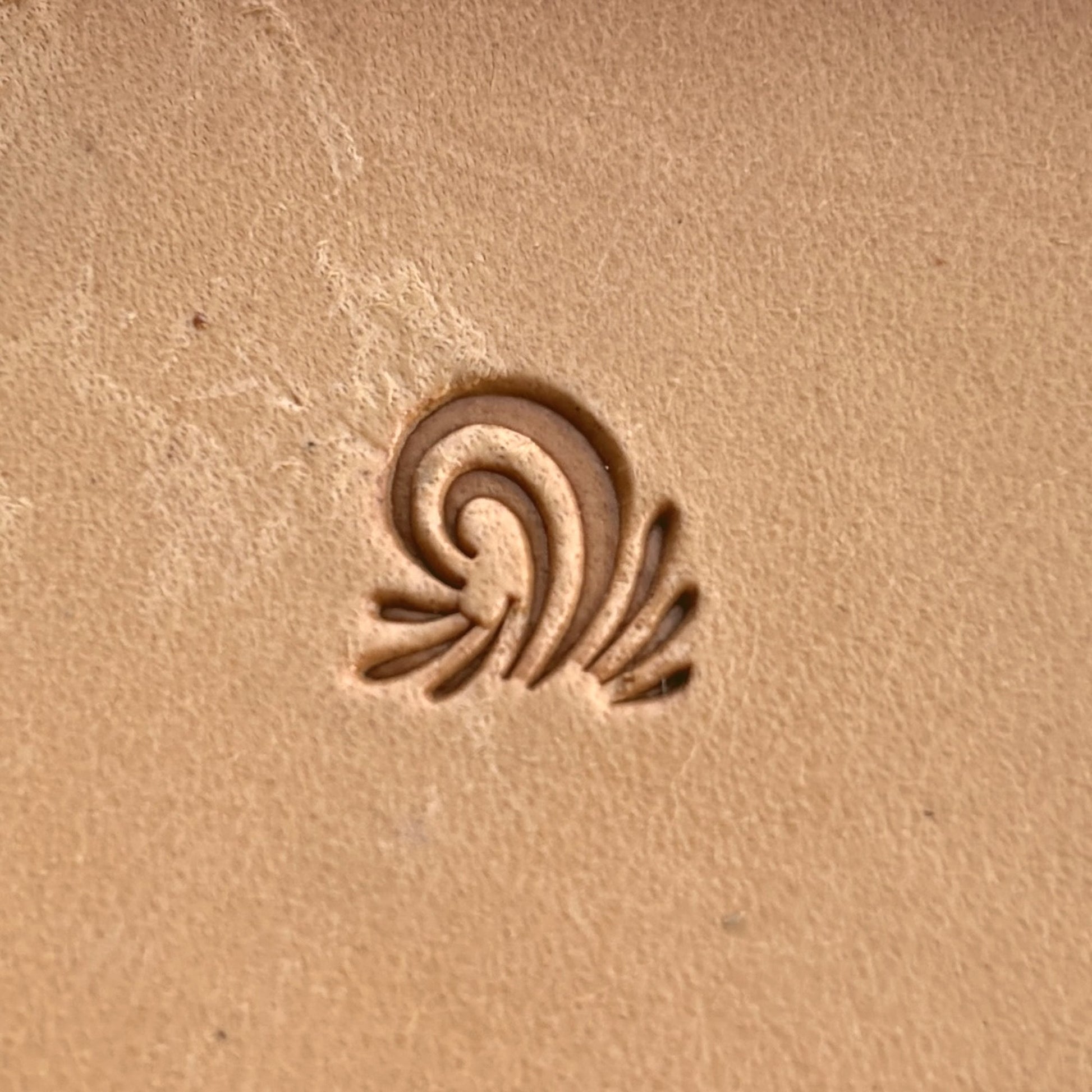 Geometric leather stamp LT263 — single impression on veg-tan leather