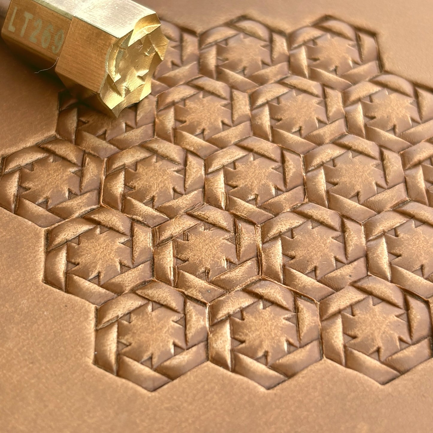 Geometric leather stamp LT269 — brass stamping tool with imprint on natural veg-tan leather