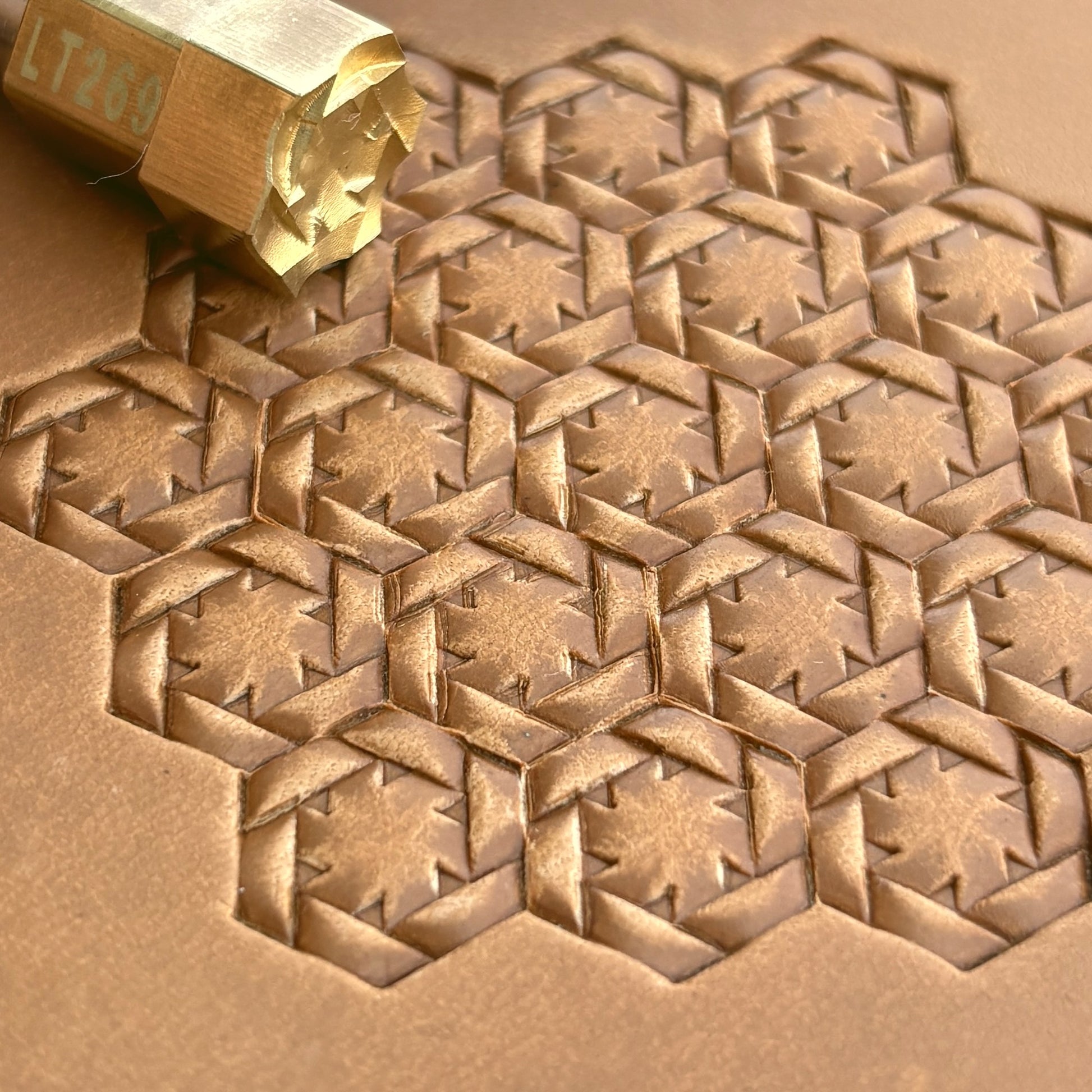 Geometric leather stamp LT269 — brass stamping tool with imprint on natural veg-tan leather