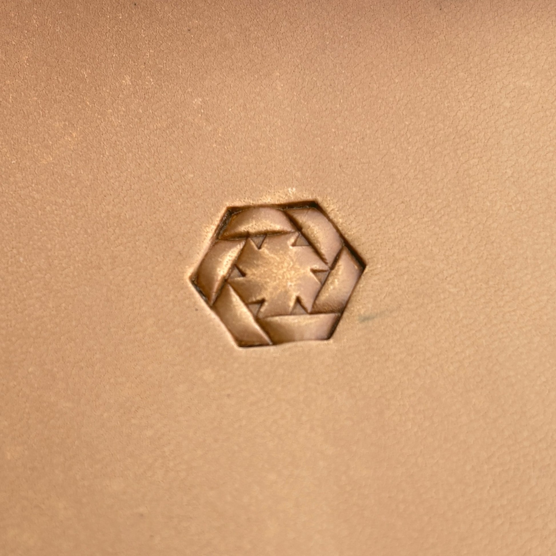 Geometric leather stamp LT269 — single impression on veg-tan leather