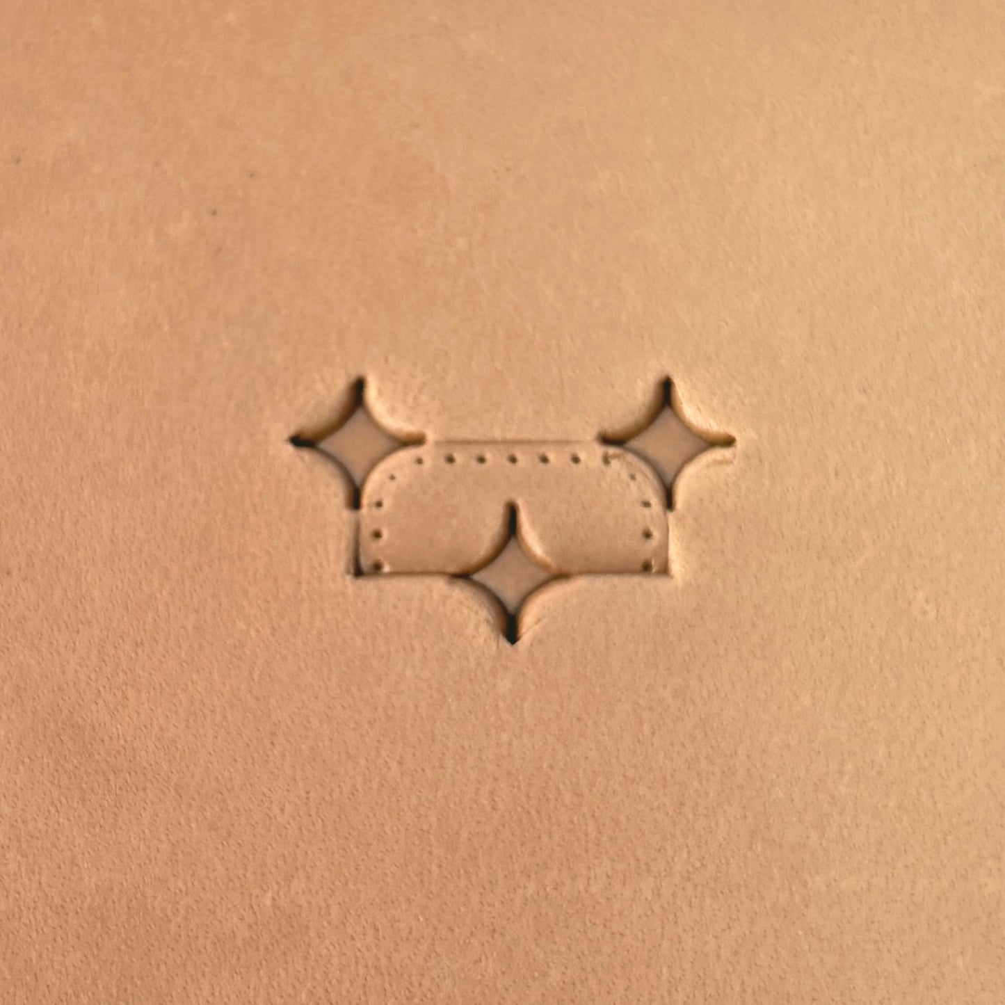 Star Tiles leather stamp LT273 — pattern imprint on veg-tan leather