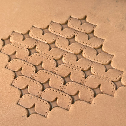 Star Tiles leather stamp LT273 — single impression on veg-tan leather
