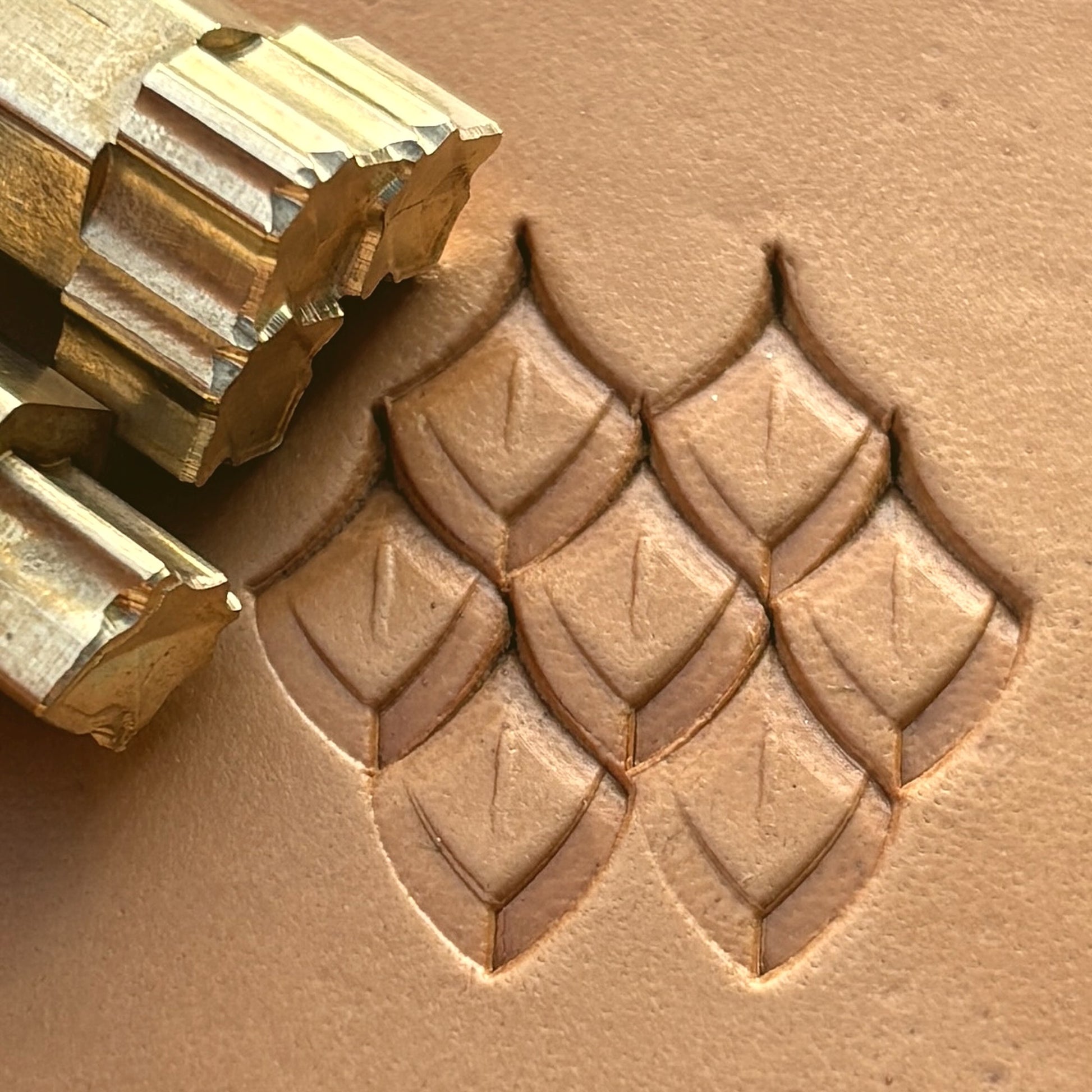 Geometric leather stamp LT284 — brass stamping tool with imprint on natural veg-tan leather
