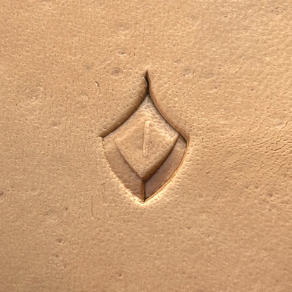 Geometric leather stamp LT284 — single impression on veg-tan leather