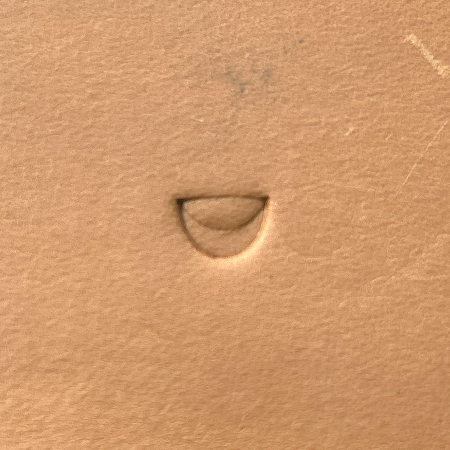 Half Moon leather stamp LT285 — single impression on veg-tan leather
