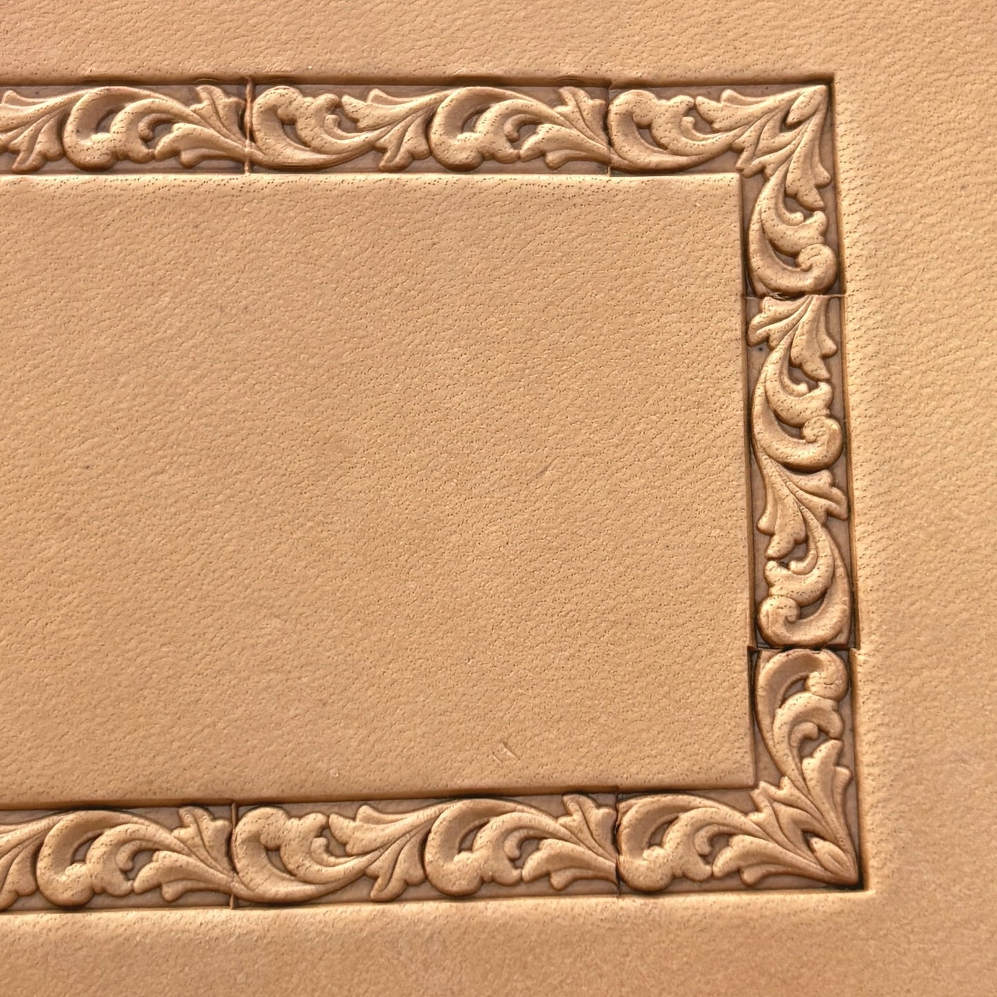Ornamental leather stamp LT288 — single impression on veg-tan leather