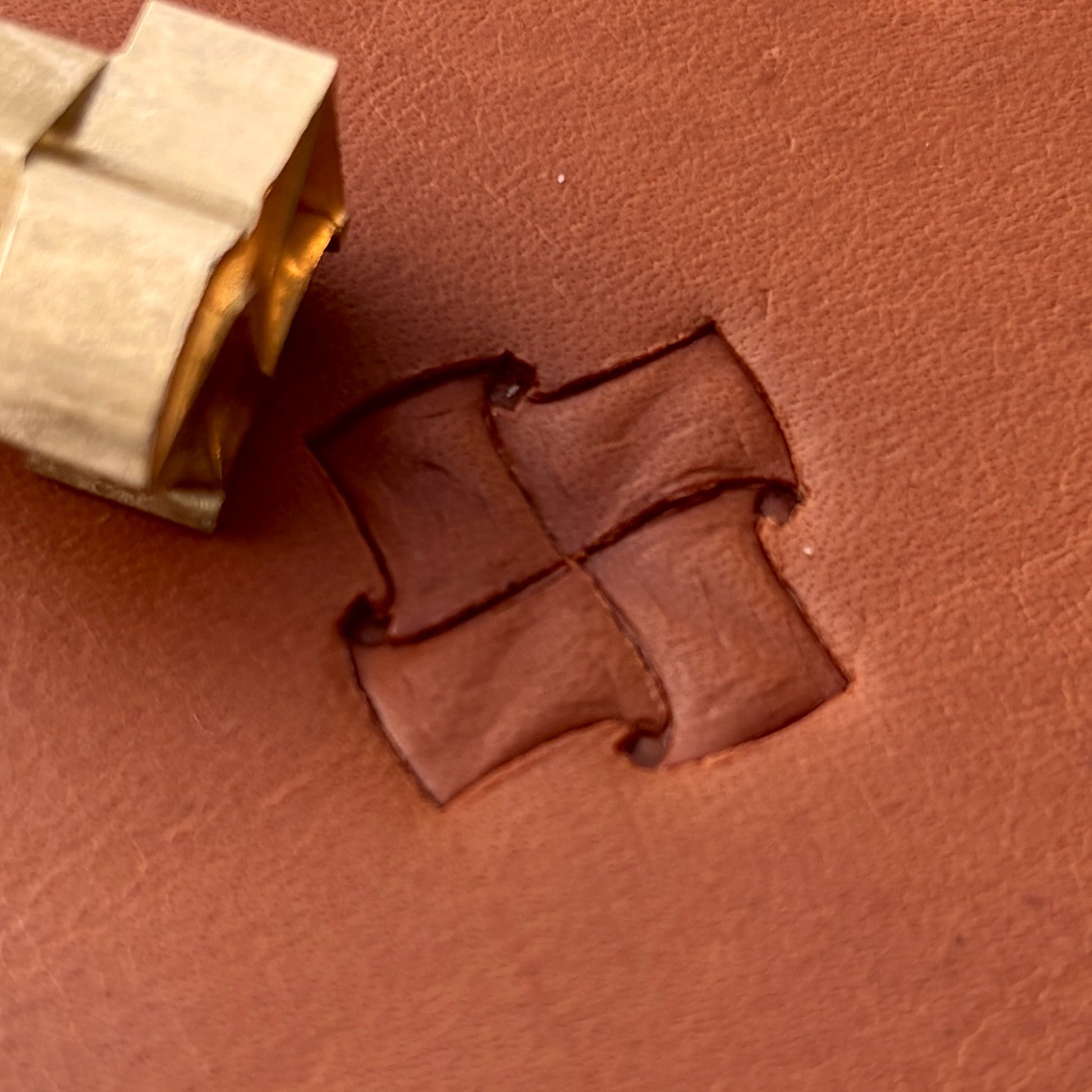 Pinwheel Geometric leather stamp LT289 — brass stamping tool with imprint on natural veg-tan leather