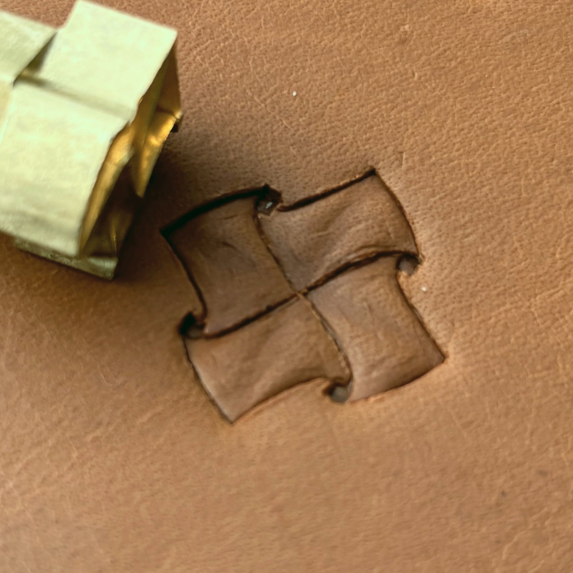 Pinwheel Geometric leather stamp LT289 — brass stamping tool with imprint on natural veg-tan leather