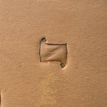 Pinwheel Geometric leather stamp LT289 — single impression on veg-tan leather