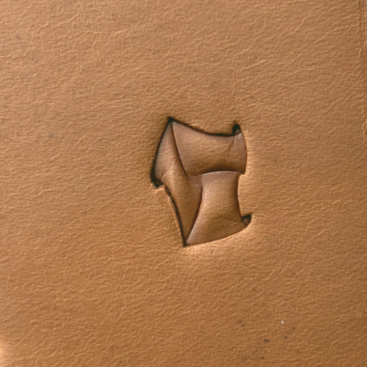 Twisted Shape Geometric leather stamp LT290 — single impression on veg-tan leather
