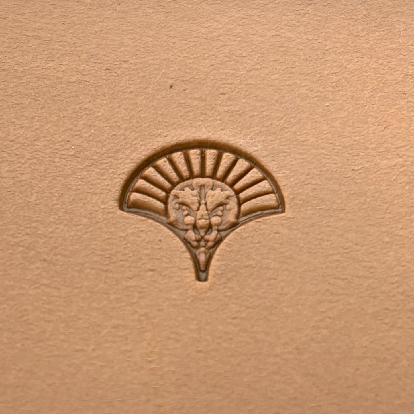Fan Motif leather stamp LT293 — single impression on veg-tan leather