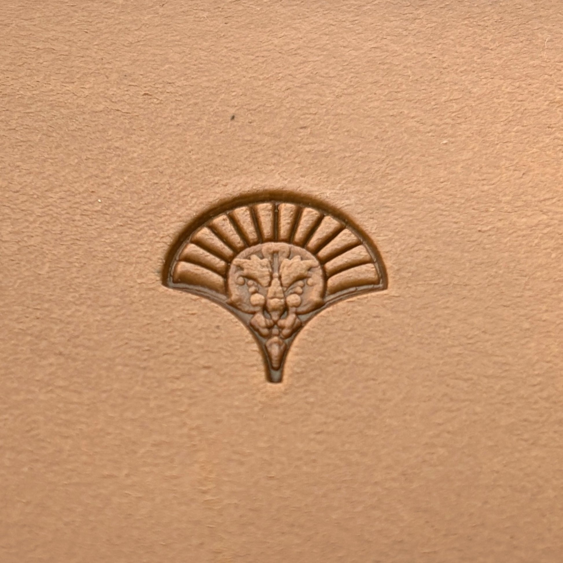 Fan Motif leather stamp LT293 — single impression on veg-tan leather
