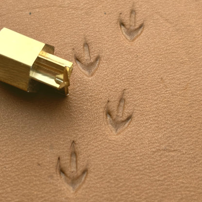 Bird Track Footprint leather stamp LT296 — brass stamping tool with imprint on natural veg-tan leather