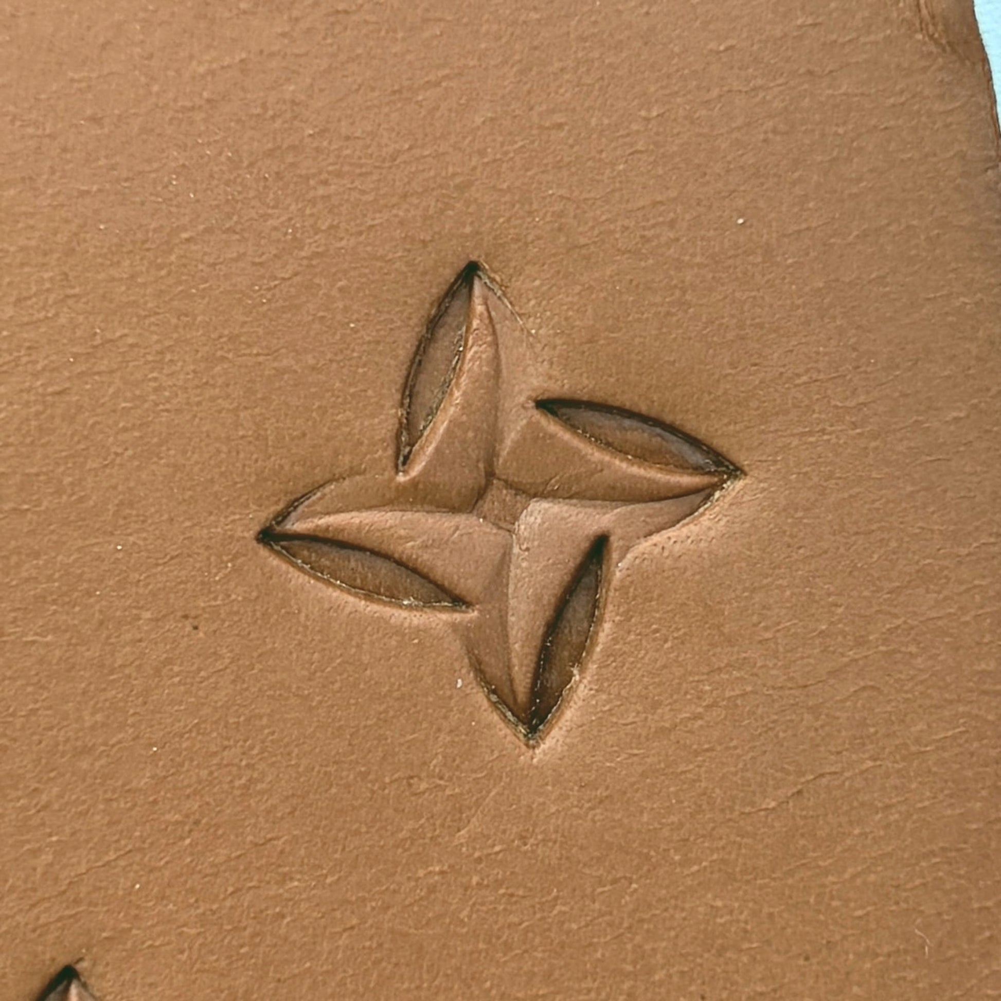 Interlocking Shapes Geometric leather stamp LT300 — single impression on veg-tan leather