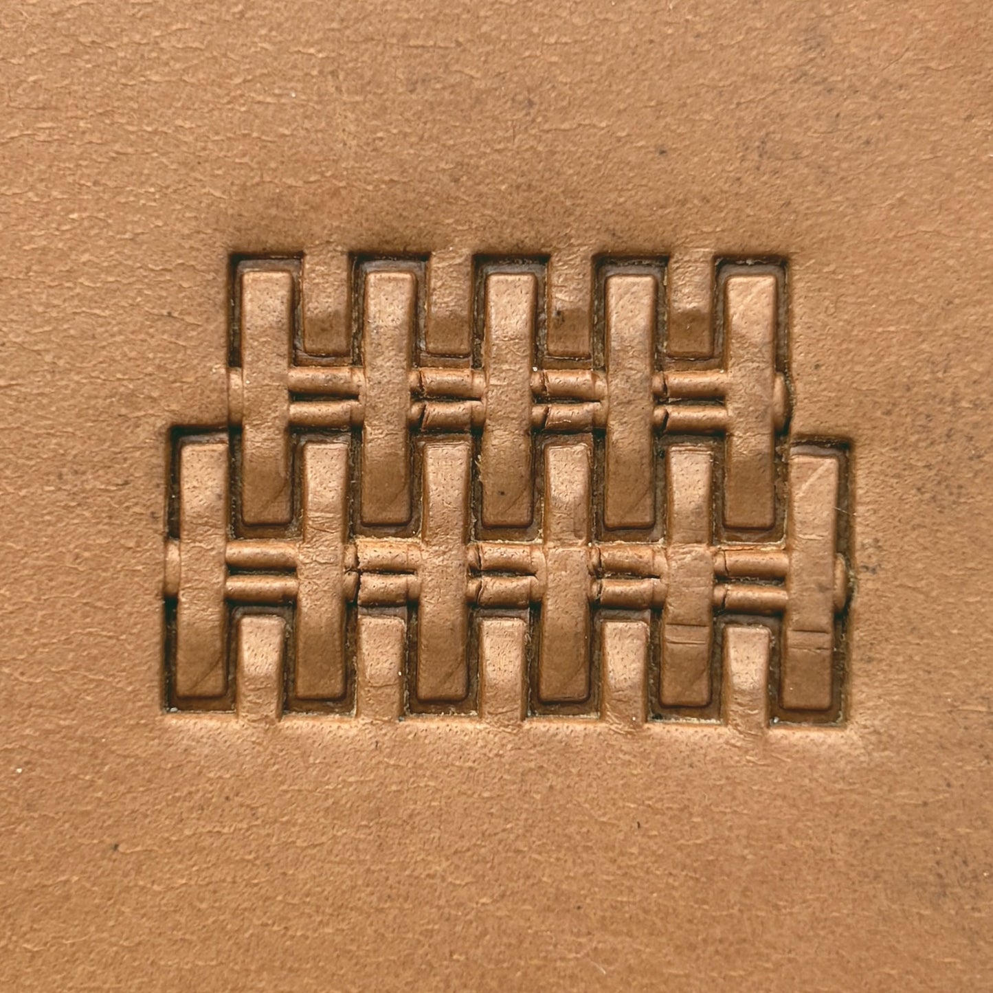 Interlocking Blocks Basket Weave leather stamp LT302 — single impression on veg-tan leather