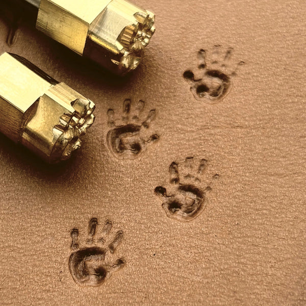 Baby Handprint leather stamp LT303 — brass stamping tool with imprint on natural veg-tan leather