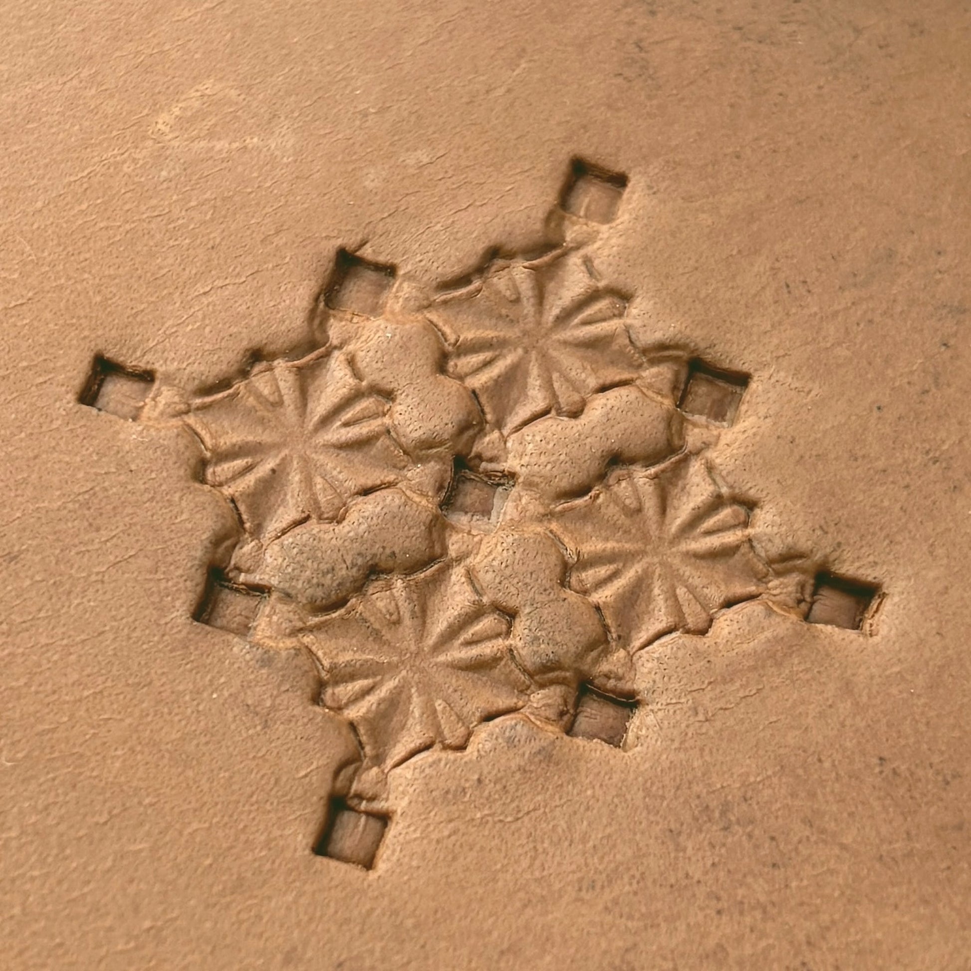 Star Center Geometric leather stamp LT304 — pattern imprint on veg-tan leather