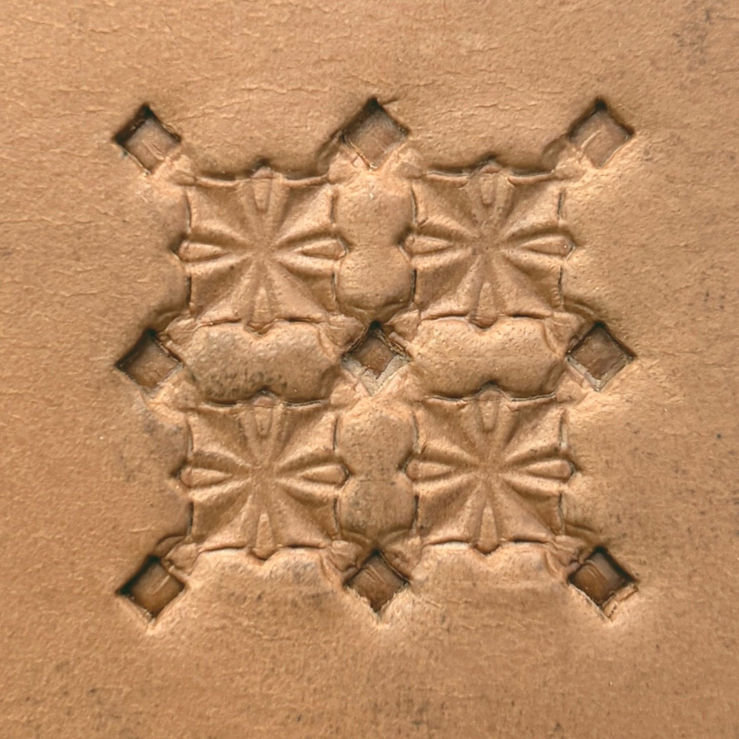 Star Center Geometric leather stamp LT304 — pattern imprint on veg-tan leather