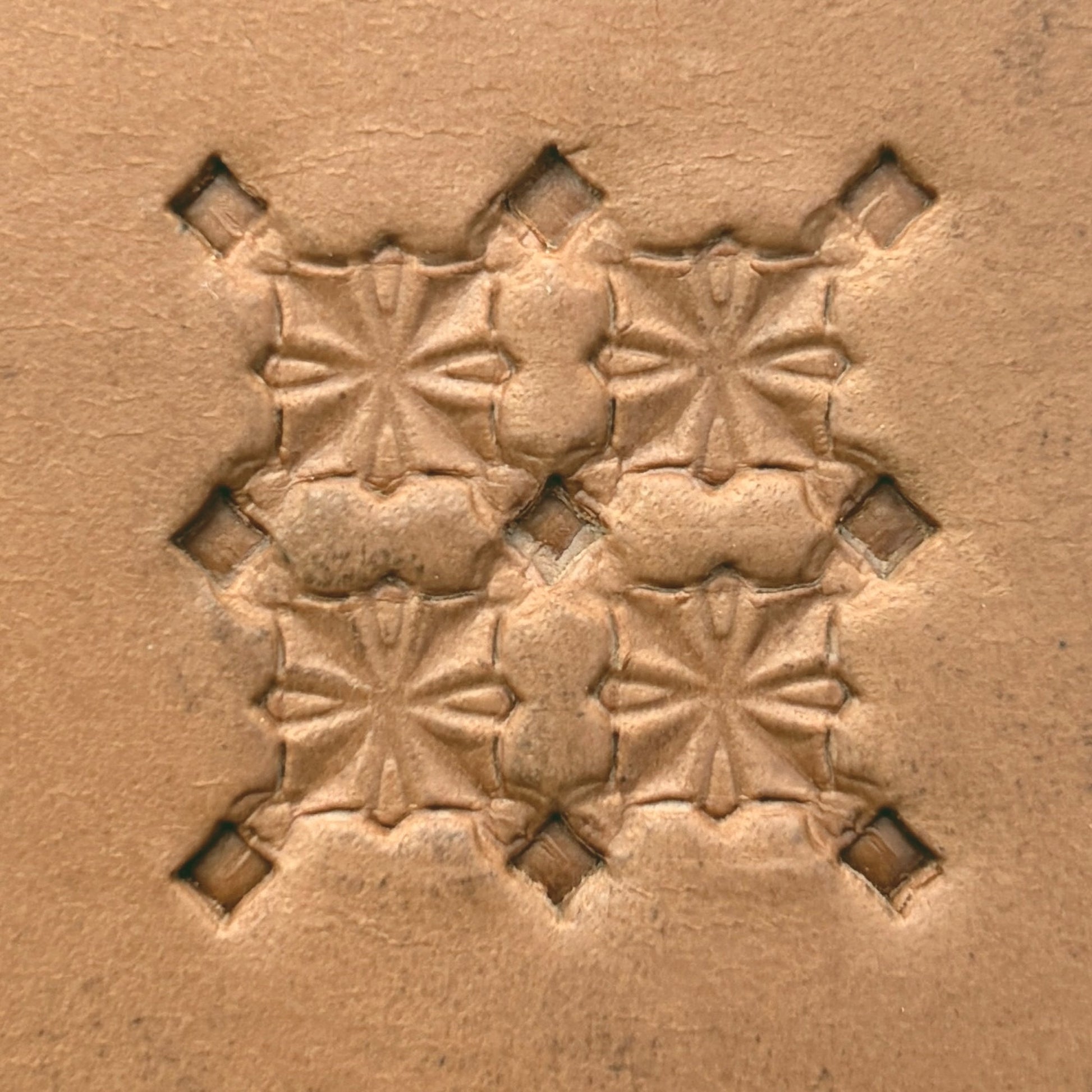 Star Center Geometric leather stamp LT304 — pattern imprint on veg-tan leather