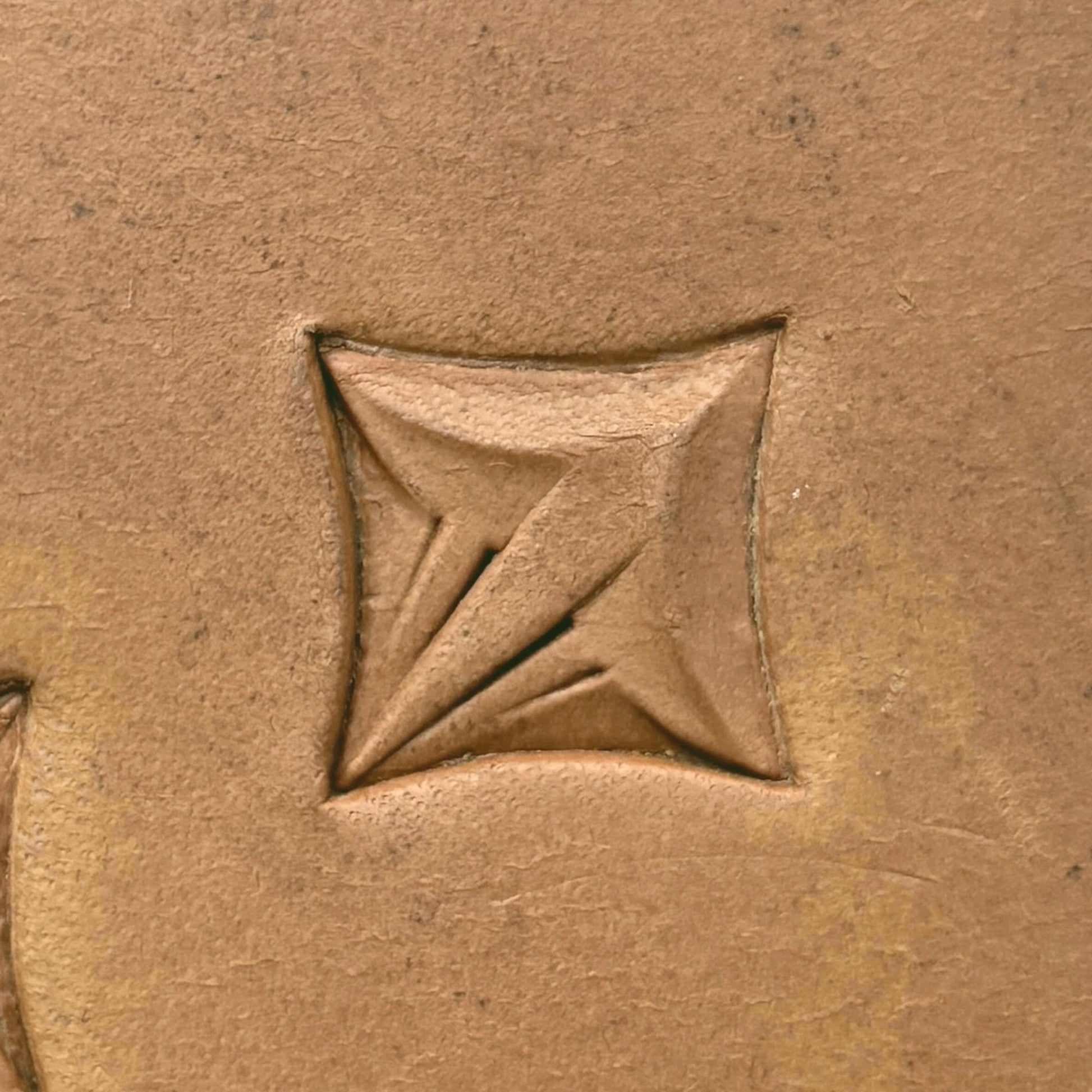 Star Shape Geometric leather stamp LT305 — single impression on veg-tan leather