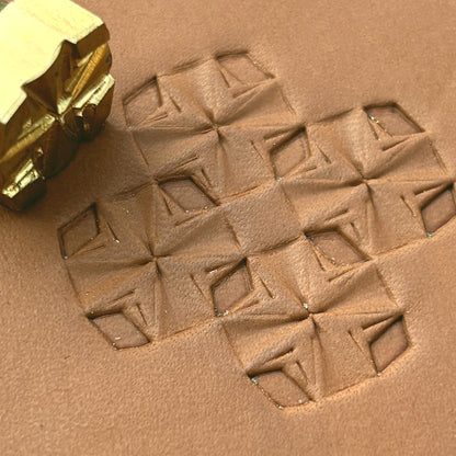 Folded Star Geometric leather stamp LT307 — brass stamping tool with imprint on natural veg-tan leather
