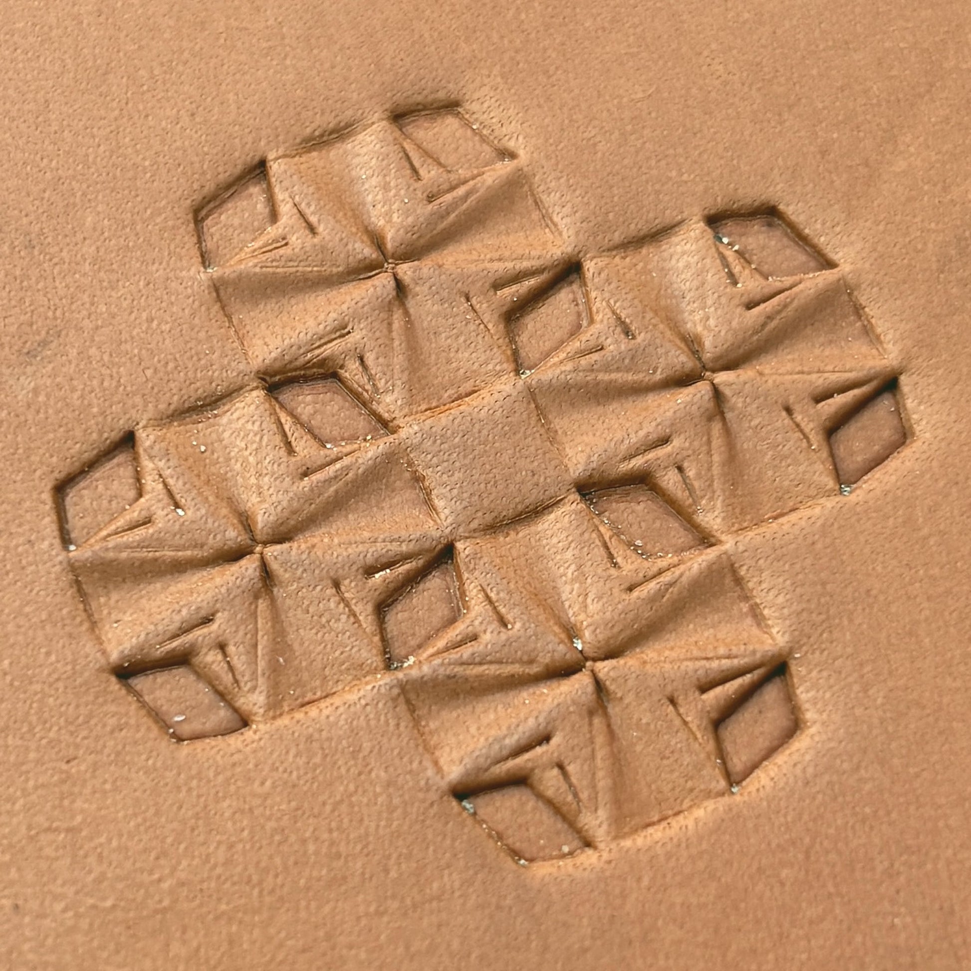 Folded Star Geometric leather stamp LT307 — pattern imprint on veg-tan leather