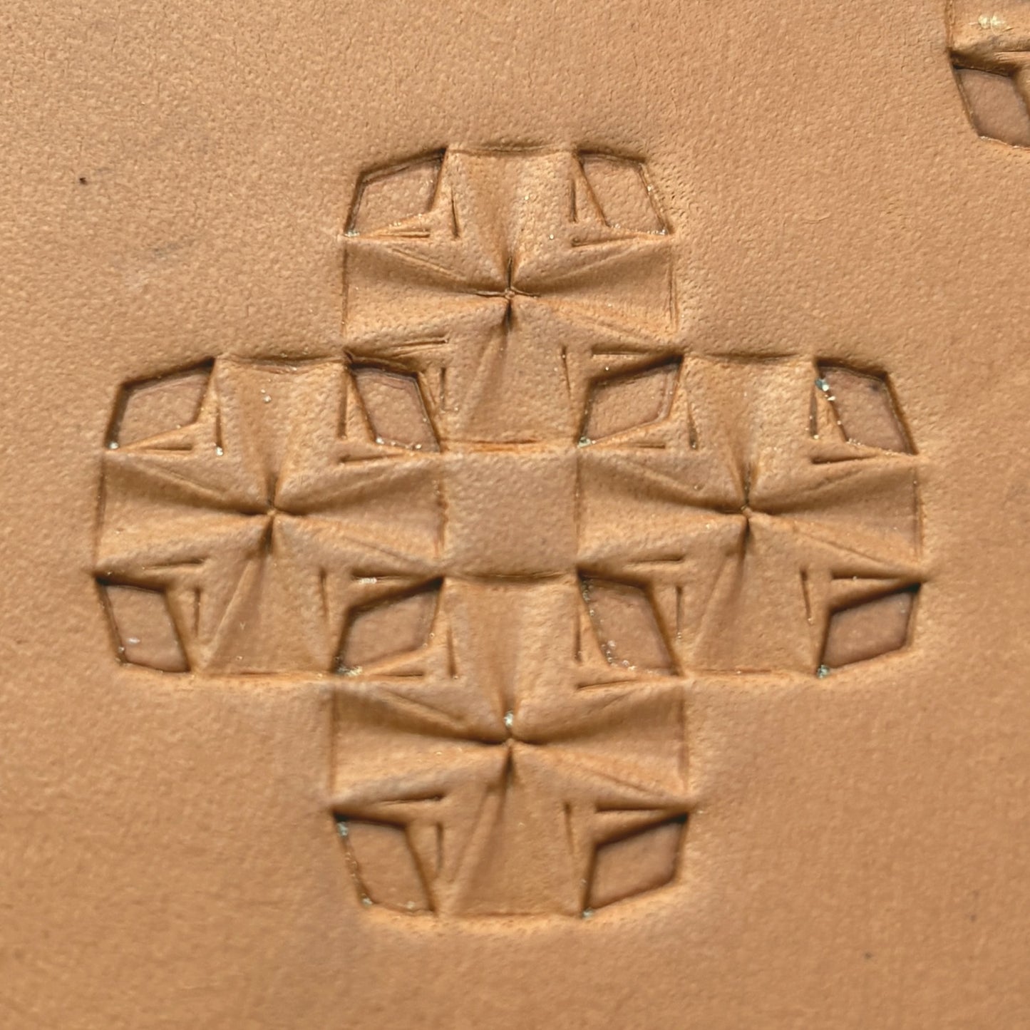 Folded Star Geometric leather stamp LT307 — pattern imprint on veg-tan leather