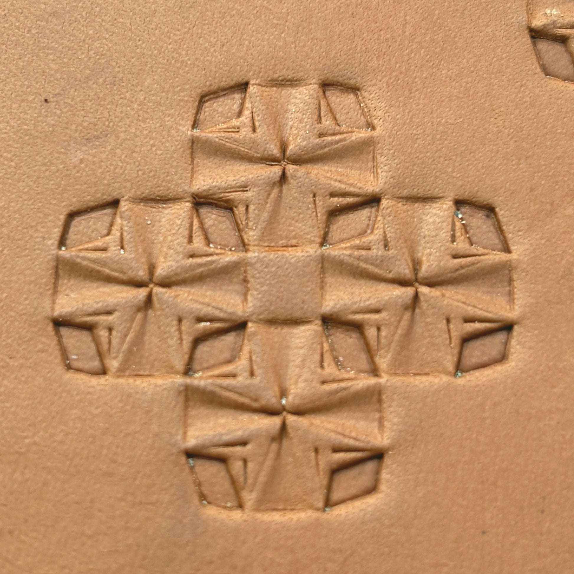 Folded Star Geometric leather stamp LT307 — pattern imprint on veg-tan leather