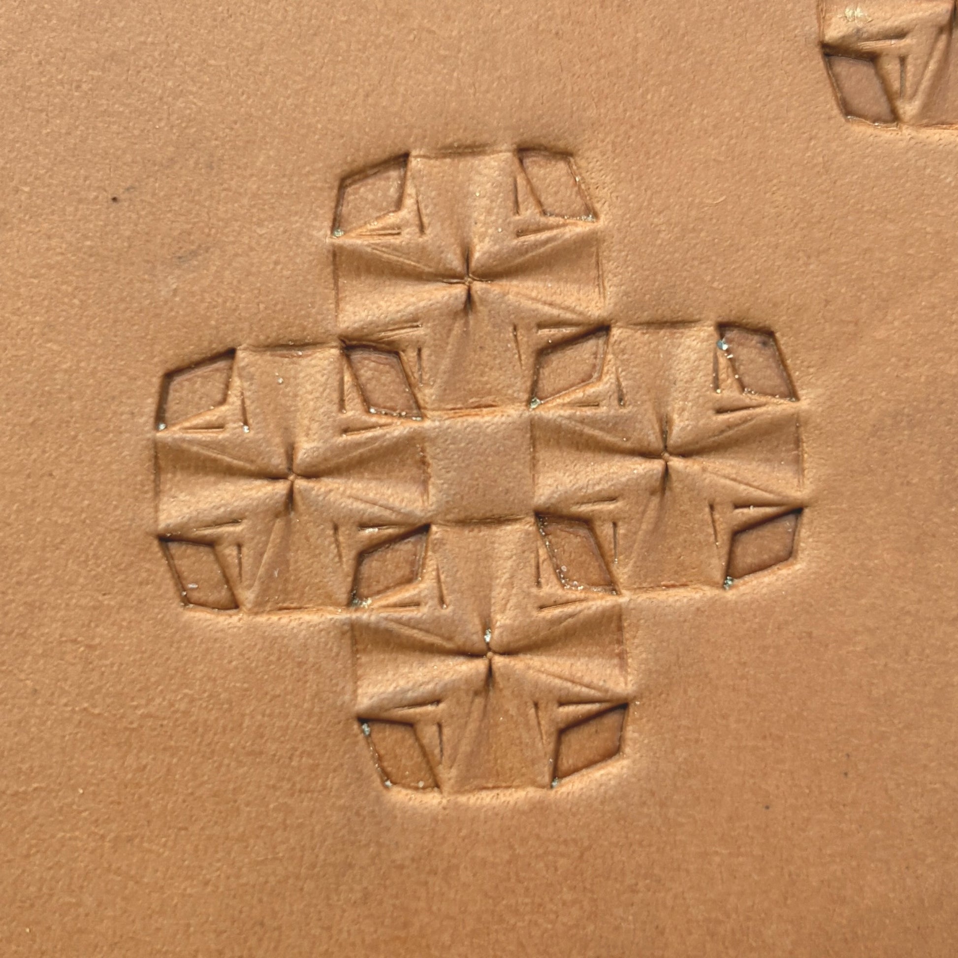 Folded Star Geometric leather stamp LT307 — pattern imprint on veg-tan leather
