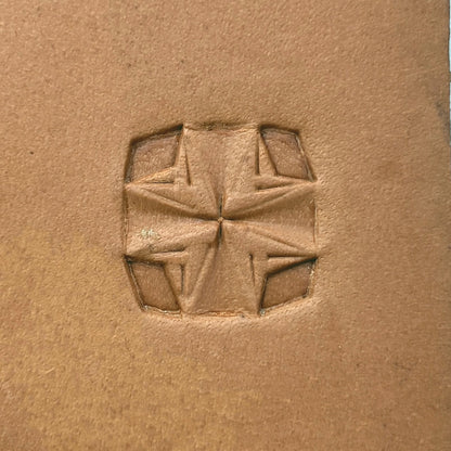 Folded Star Geometric leather stamp LT307 — single impression on veg-tan leather