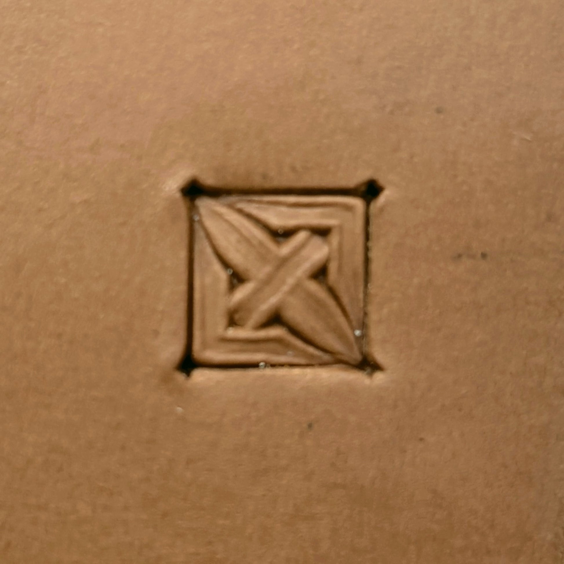 Cross Squares Geometric leather stamp LT308 — single impression on veg-tan leather