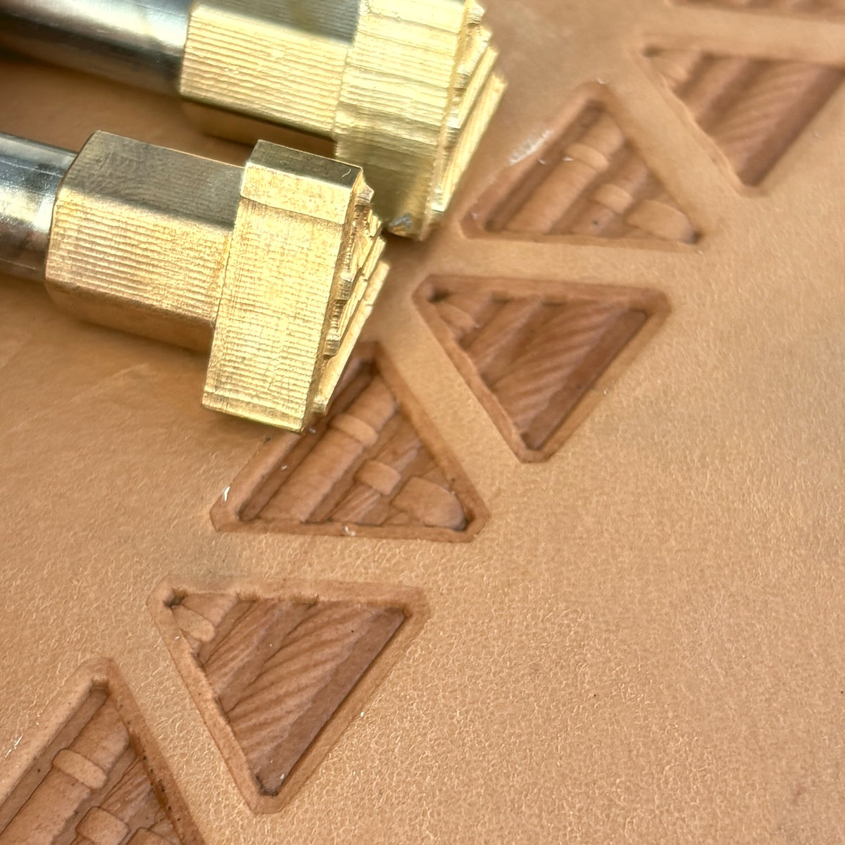 Geometric leather stamp LT313 — brass stamping tool with imprint on natural veg-tan leather