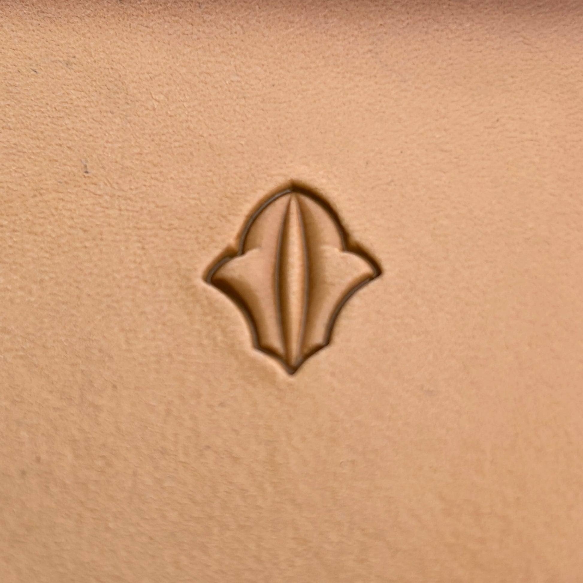 Geometric leather stamp LT315 — single impression on veg-tan leather