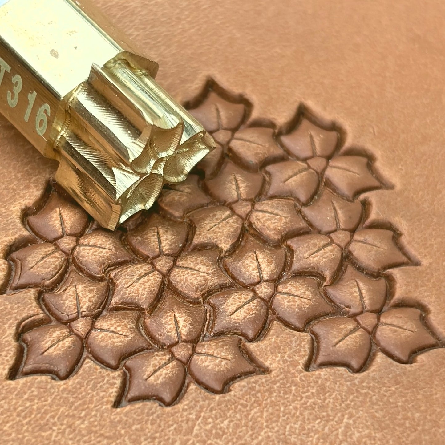 Floral Cluster Leaf leather stamp LT316 — brass stamping tool with imprint on natural veg-tan leather