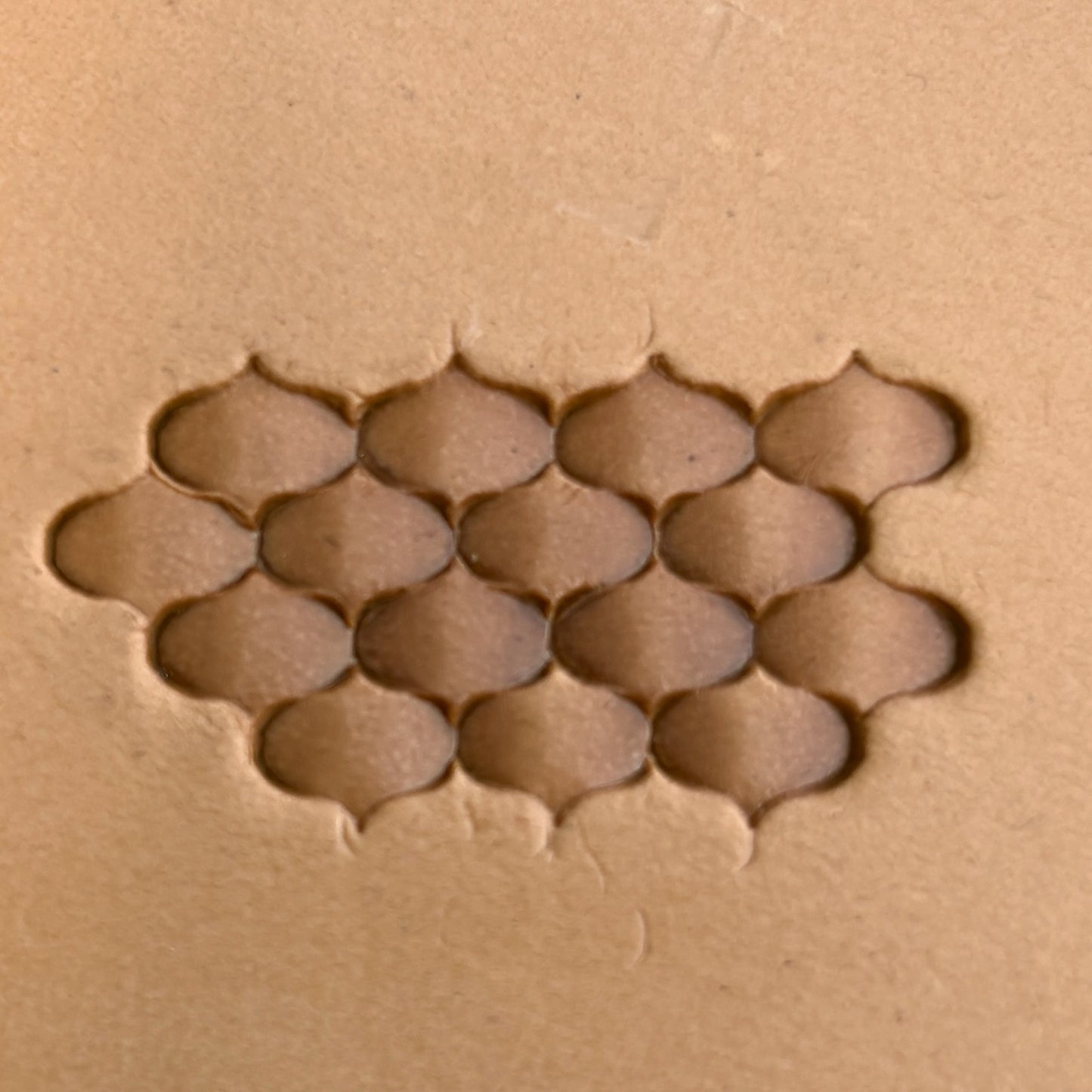 Honeycomb leather stamp LT318 — pattern imprint on veg-tan leather