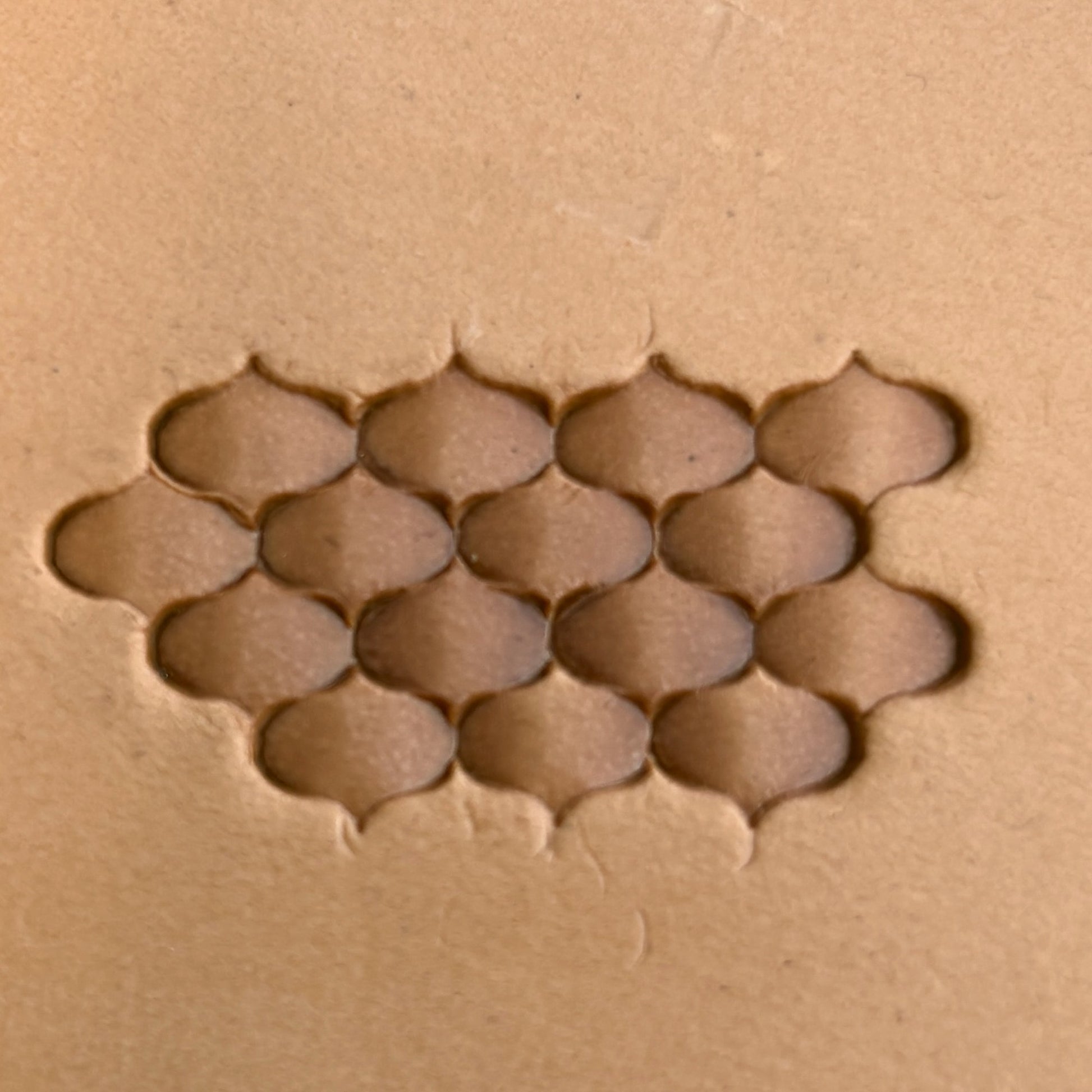 Honeycomb leather stamp LT318 — pattern imprint on veg-tan leather