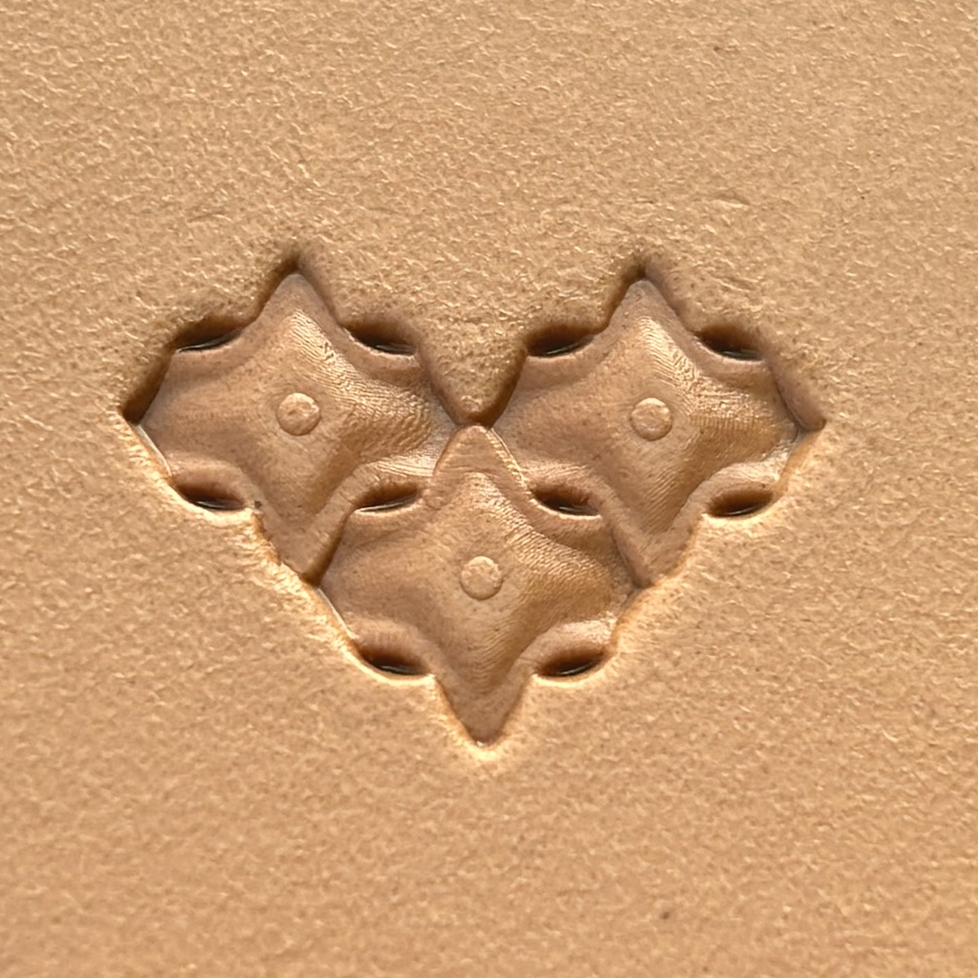 Diamond Tiles leather stamp LT319 — single impression on veg-tan leather