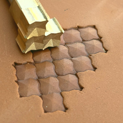 Geometric leather stamp LT320 — single impression on veg-tan leather