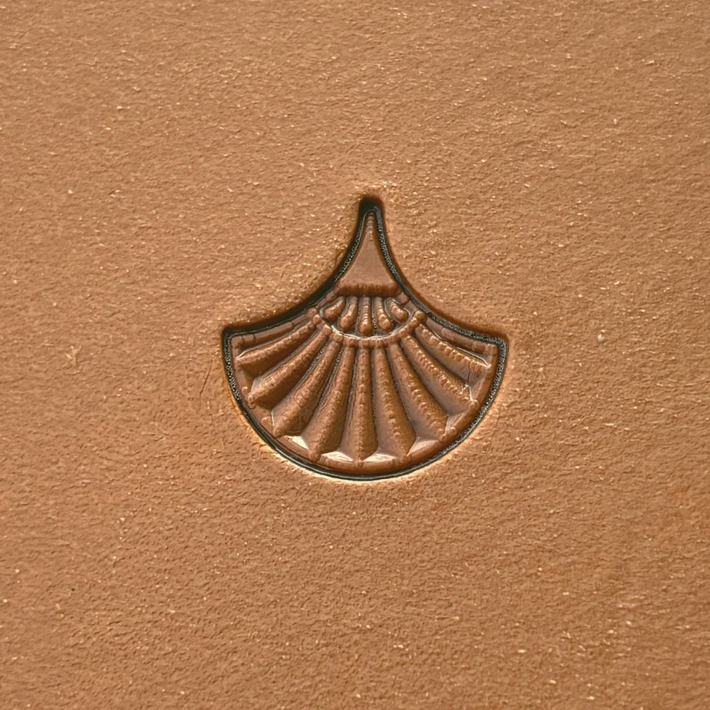 Geometric leather stamp LT322 — single impression on veg-tan leather