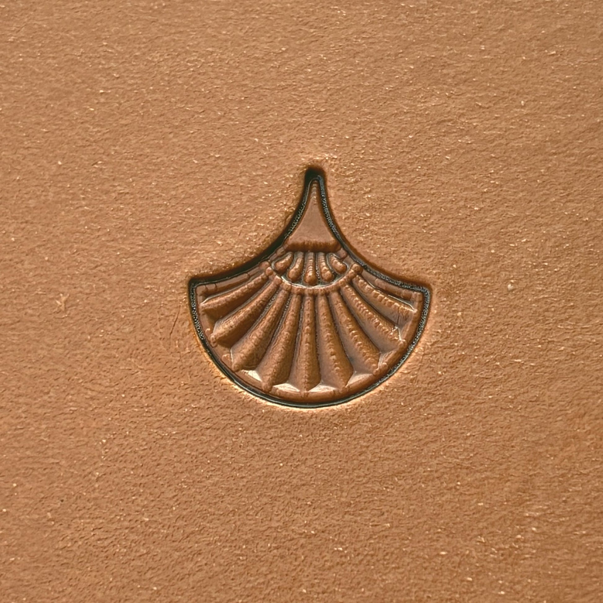 Geometric leather stamp LT322 — single impression on veg-tan leather