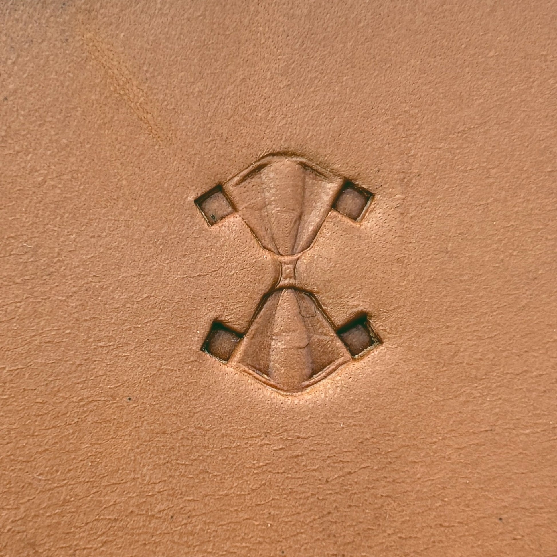 Hourglass Shape Geometric leather stamp LT323 — single impression on veg-tan leather