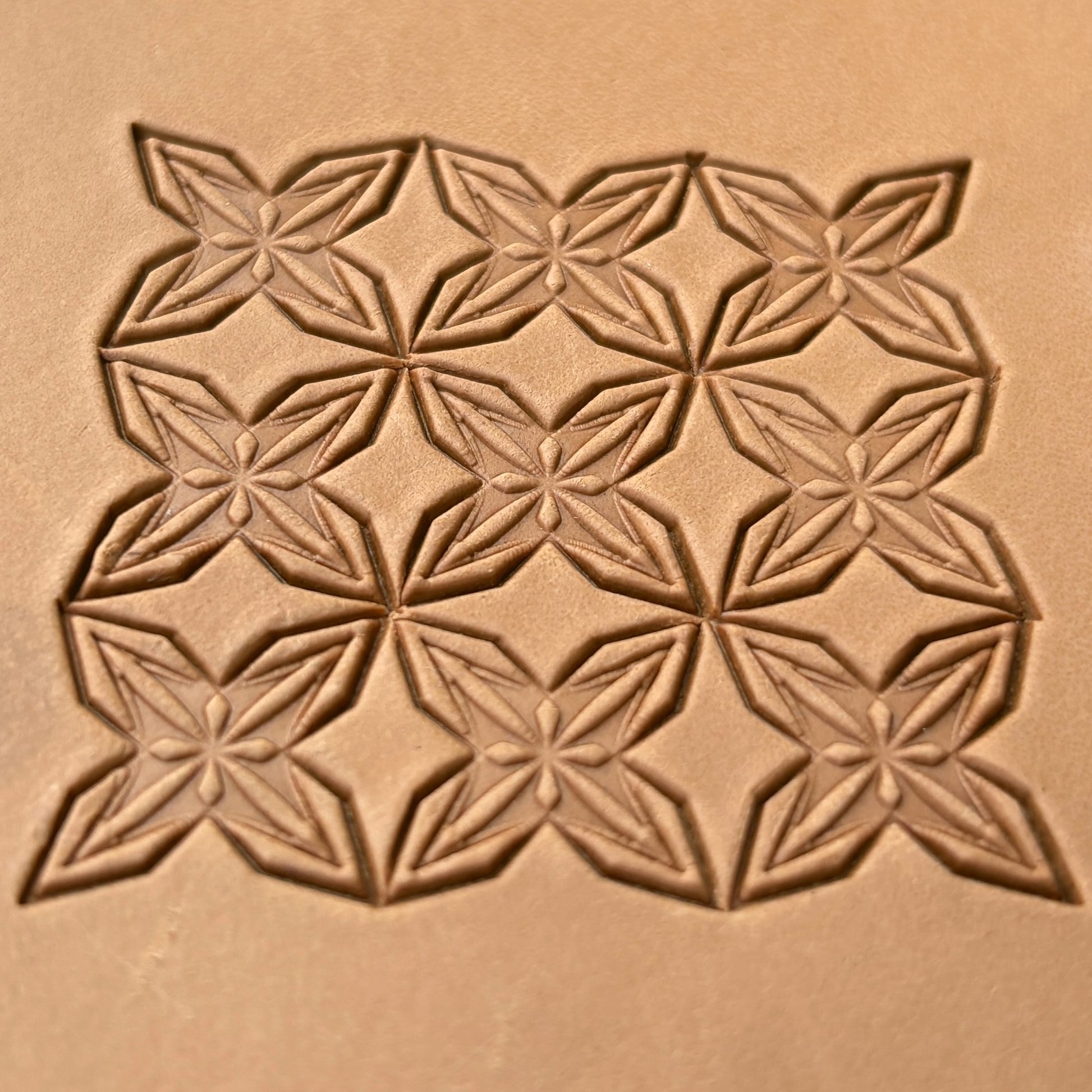 Star Mosaic Geometric leather stamp LT324 — single impression on veg-tan leather