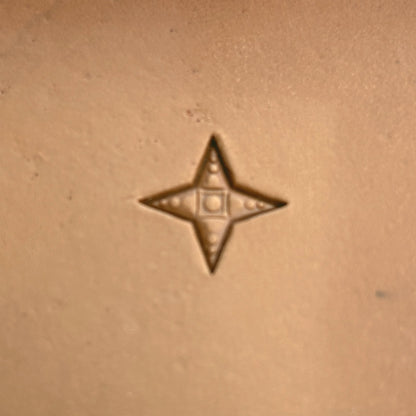 Geometric leather stamp LT325 — single impression on veg-tan leather
