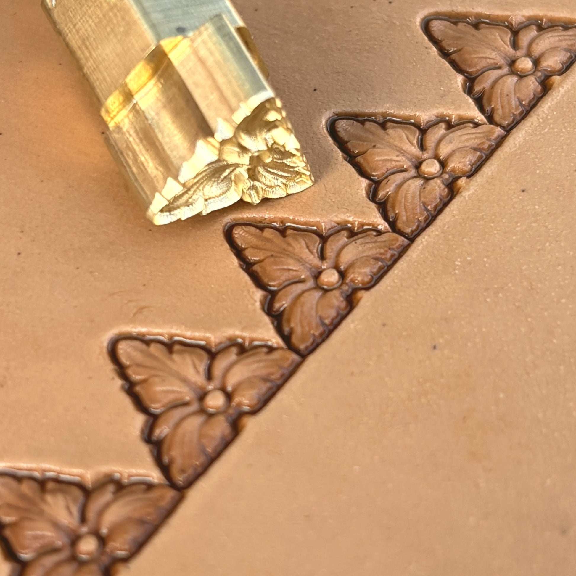Fleur Accent leather stamp LT329 — brass stamping tool with imprint on natural veg-tan leather