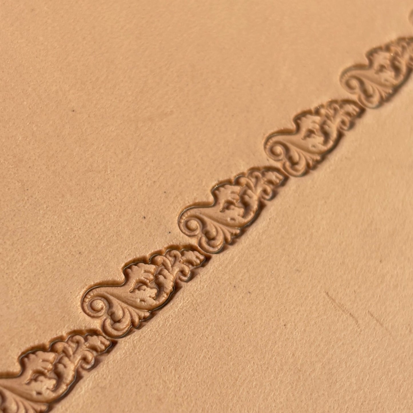 Scroll Border leather stamp LT331 — brass stamping tool with imprint on natural veg-tan leather