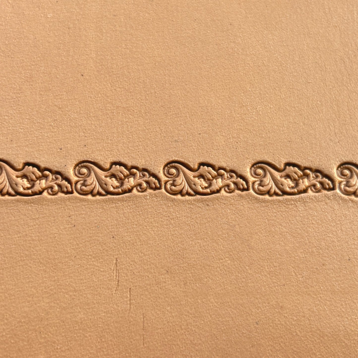 Scroll Border leather stamp LT331 — pattern imprint on veg-tan leather