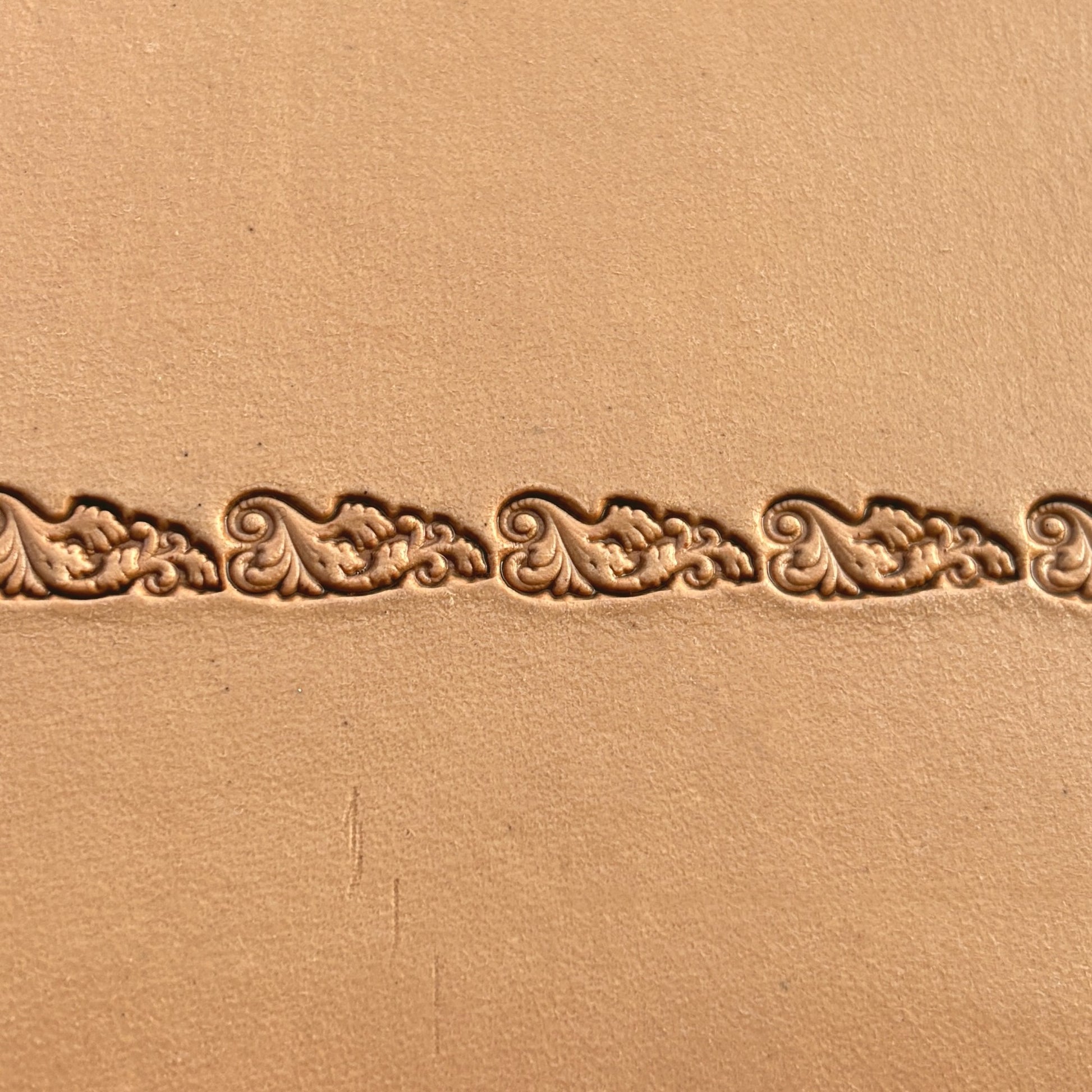 Scroll Border leather stamp LT331 — pattern imprint on veg-tan leather
