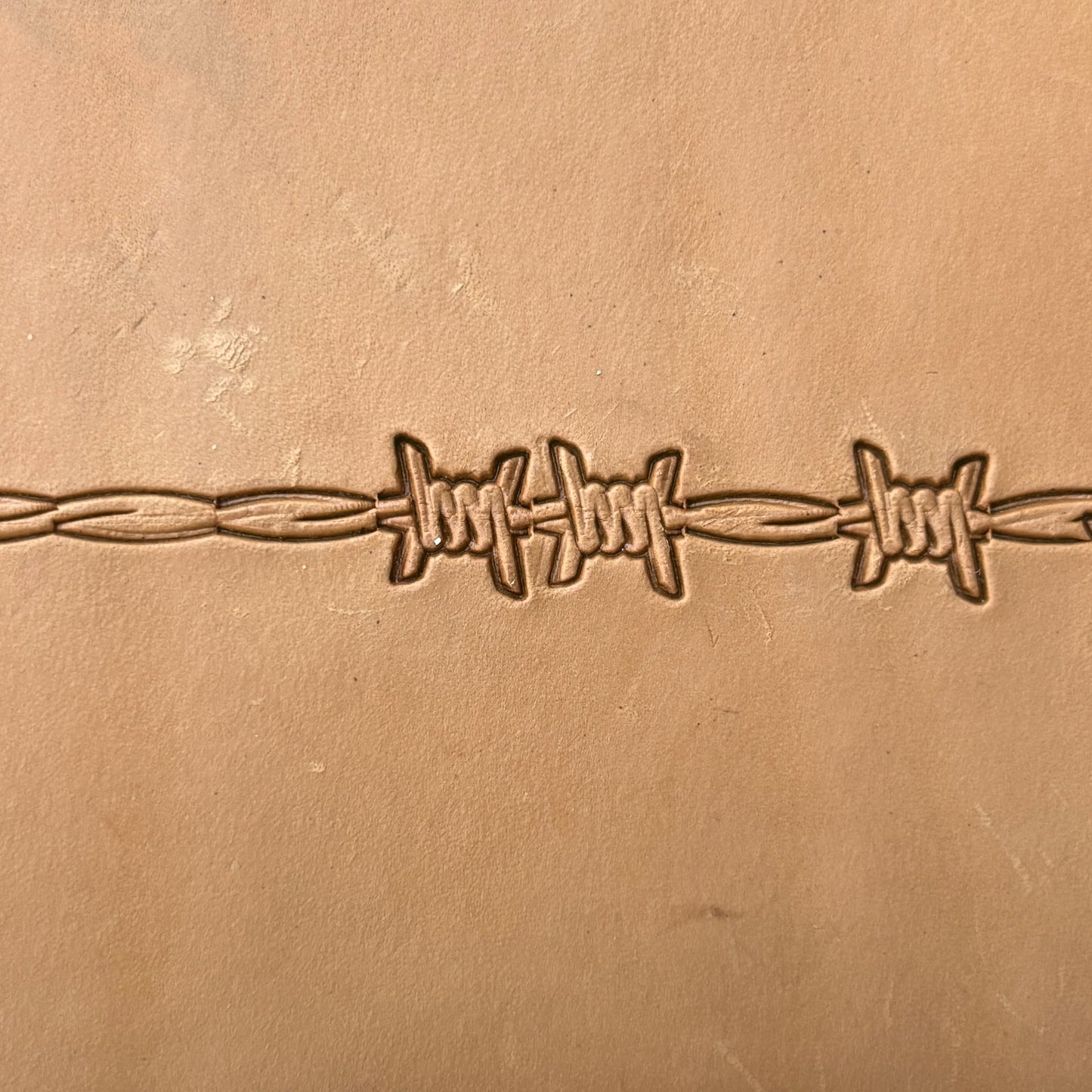 Barbed Wire leather stamp LT335 — pattern imprint on veg-tan leather